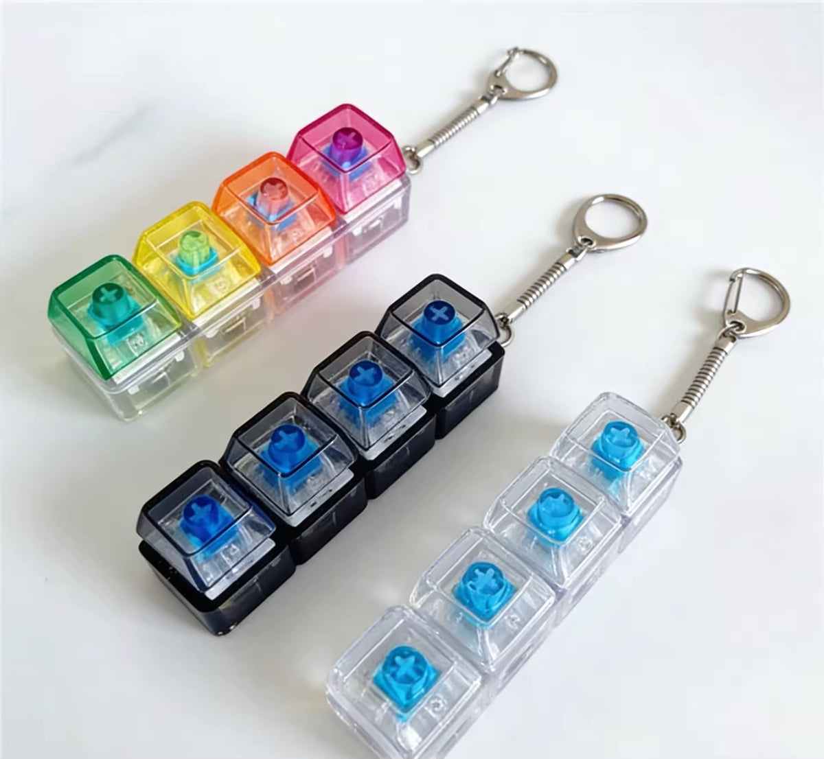 Hot Selling Luminous Keyboard Clicker Keychain 4-Key Fidget Toy Stress Relief LED Pendant for Office Desk Decoration