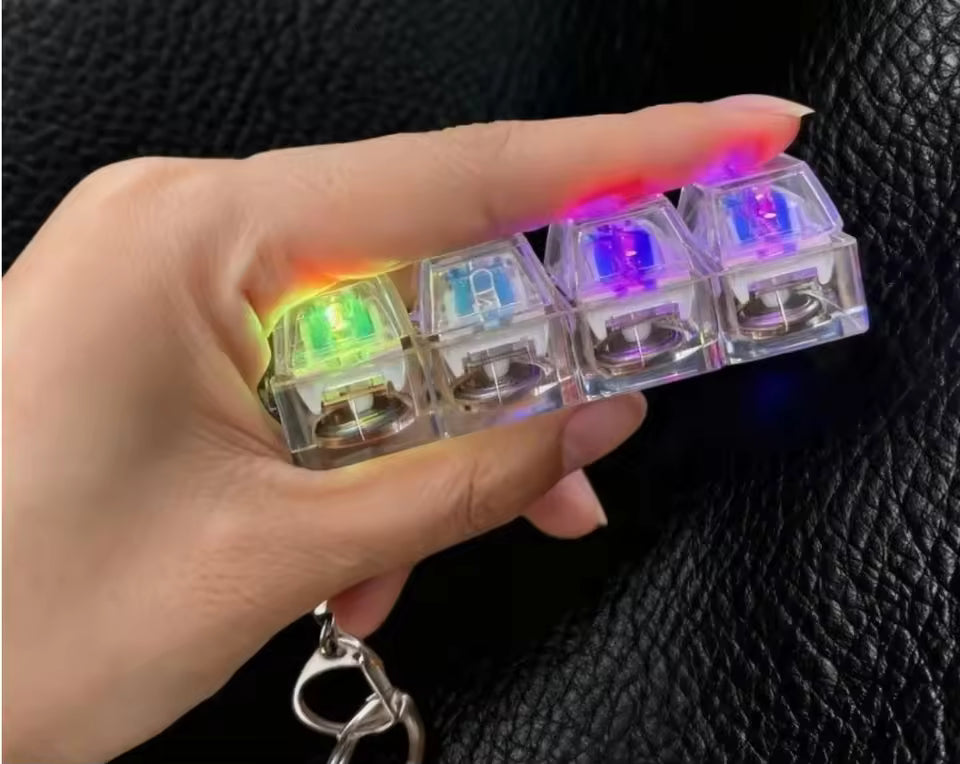 Hot Selling Luminous Keyboard Clicker Keychain 4-Key Fidget Toy Stress Relief LED Pendant for Office Desk Decoration